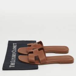 Pre Owned صندل سلايد هيرمس أوران فلات جلد أبيض مقاس 39