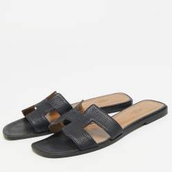 Pre Owned صندل سلايد هيرمس أوران فلات جلد سحلية أزرق كحلي مقاس 39.5