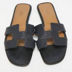 Pre Owned صندل سلايد هيرمس أوران فلات جلد سحلية أزرق كحلي مقاس 39.5