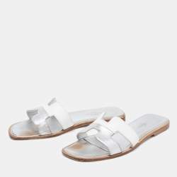 Pre Owned Hermes Silver/White Leather Oran Flat Sandals Size 36.5