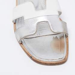 Pre Owned Hermes Silver/White Leather Oran Flat Sandals Size 36.5