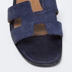 مملوكة مسبقًا صندل سلايد هيرمس أوران فلات جلد سحلية أزرق كحلي مقاس 39.5