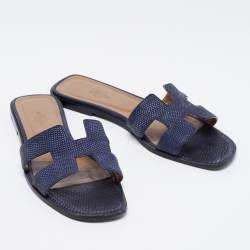 مملوكة مسبقًا صندل سلايد هيرمس أوران فلات جلد سحلية أزرق كحلي مقاس 39.5