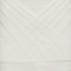 Pre Owned تنورة هيرفي ليجي بانداج عاجي مزين طرف واسع مقاس صغير جداً - إكس سمول