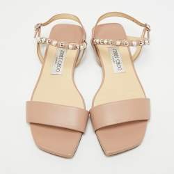 مملوكة مسبقًا صندل جيمي تشو عادرا جلد بيج بحزام للكاحل مسطح مقاس 39 