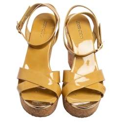 مملوكة مسبقًا Jimmy Choo Yellow Patent Leather Lucia Cross Strap Wedge Ankle-Strap Sandal Size 39