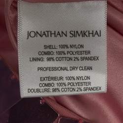 Pre Owned طقم تنورة لوسي وحمالة صدر رونيت باستيك جليتر وردي من جوناثان سيمخاي مقاس صغير جداً - إكس إس