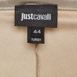 Pre Owned بلوزة ذات حاشية غير متساوية معدنية ذهبية بأكمام طويلة من جيرسي جاست كافالي مقاس متوسط - ميديم