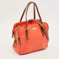 Pre Owned حقيبة ساتشل كيت سبيد جلد متعدد السحابات حمراء مرجانية