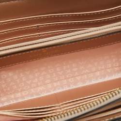 Pre Owned Kate Spade Metallic Peach Leather  Wellesley Wristlet Wallet