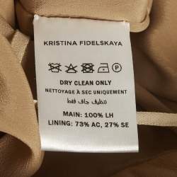 Pre Owned بنطلون كريستينا فيدلسكايا جلد بيج مطوي بمقاس صغير جدًا (إكس سمول)