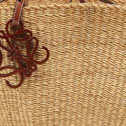 Pre Owned Loewe Brown/Tan Woven Raffia Small Shell Basket Bag