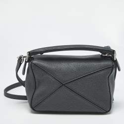 مملوك ة مسبقًا حقيبة كتف لويفي بازيل صغيرة جلد أسود