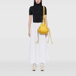 Pre Owned Loewe Yellow Small Grained Calfskin Drawstring Hammock Satchel