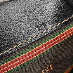 مملوكة مسبقًا حقيبة لويفي فيلاسكويز جلد سوداء بنية ثنائية الاتجاه حمل كتف