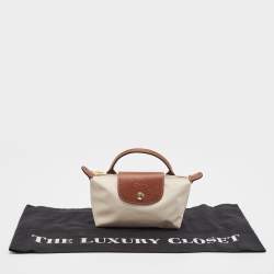 Pre Owned Longchamp Off White Nylon Le Pliage Handle Pouch