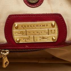 مملوكة مسبقًا حقيبة يد لونج شامب جلد نقش شعار ذهبي عنابي LM كوير