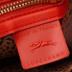 Pre Owned Longchamp Orange Perforated Leather Mademoiselle Top Handle Bag