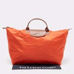 Pre Owned Longchamp Orange Nylon Le Pliage Travel Tote