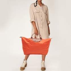 Pre Owned Longchamp Orange Nylon Le Pliage Travel Tote