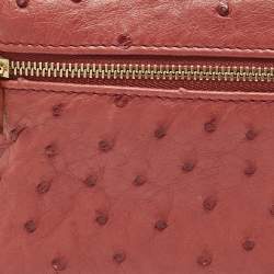 مملوكة مسبقًا حقيبة صغيرة لورو بيانا L19 جلد نعام أحمر بجيب إضافي