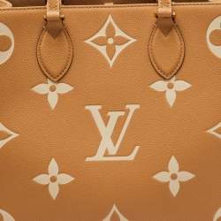 Pre Owned Louis Vuitton Beige/Ivory Monogram Empreinte Leather Onthego MM Tote Bag