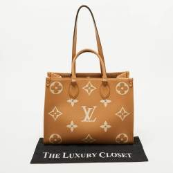 Pre Owned Louis Vuitton Beige/Ivory Monogram Empreinte Leather Onthego MM Tote Bag