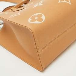 Pre Owned Louis Vuitton Beige/Ivory Monogram Empreinte Leather Onthego MM Tote Bag