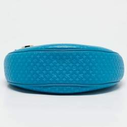 Pre Owned Louis Vuitton Blue Nanogram Embossed Leather Loop Bag