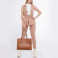 Pre Owned Louis Vuitton Cognac Monogram Empreinte Leather Onthego MM Bag