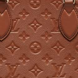 Pre Owned Louis Vuitton Cognac Monogram Empreinte Leather Onthego MM Bag