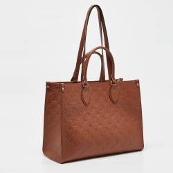 Pre Owned Louis Vuitton Cognac Monogram Empreinte Leather Onthego MM Bag