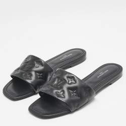 مملوكة مسبقًا Louis Vuitton Black Monogram Embossed Leather Revival Flat Slides Size 38