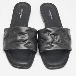 مملوكة مسبقًا Louis Vuitton Black Monogram Embossed Leather Revival Flat Slides Size 38