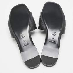 مملوكة مسبقًا Louis Vuitton Black Monogram Embossed Leather Revival Flat Slides Size 38