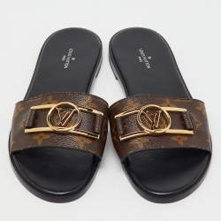 Pre Owned Louis Vuitton Brown Monogram Canvas Lock It Flat Slide Sandals Size 39