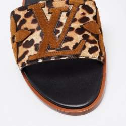 Pre Owned Louis Vuitton Brown/Beige Leopard Print Pony Hair Flat Slides Size 38