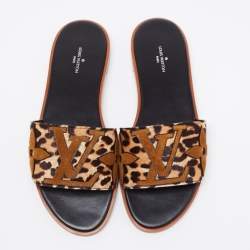 Pre Owned Louis Vuitton Brown/Beige Leopard Print Pony Hair Flat Slides Size 38
