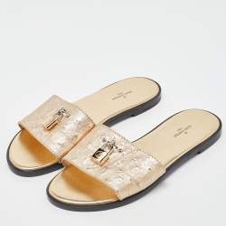 Pre Owned Louis Vuitton Gold Ostrich Leather Lock It Flat Sandals Size 38