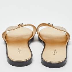 Pre Owned Louis Vuitton Gold Ostrich Leather Lock It Flat Sandals Size 38