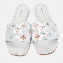 Pre Owned Louis Vuitton Silver Monogram Embossed Leather Revival Flat Slides Size 39