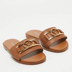 مملوكة مسبقًا Louis Vuitton Tan Leather Lock It Flat Slides Size 37