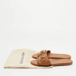مملوكة مسبق ًا Louis Vuitton Tan Leather Lock It Flat Slides Size 37