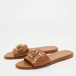 مملوكة مسبقًا Louis Vuitton Tan Leather Lock It Flat Slides Size 37