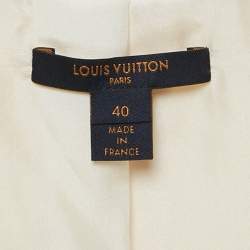 مملوكة مسبقًا توب لوي فيتون قشدي من الكريب �بحزام بلا أكمام مقاس متوسط