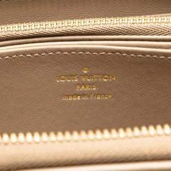 Louis Vuitton Beige Leather Monogram Zippy Wallet