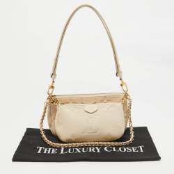 Pre Owned Louis Vuitton Cream Empreinte Leather Multi Pochette Accessoires Bag