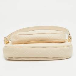 Pre Owned Louis Vuitton Cream Empreinte Leather Multi Pochette Accessoires Bag