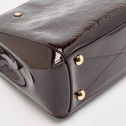 مملوكة مسبقًا حقيبة لوي فيتون مونتايغن بي بي جلد لامع مونوغرامي بني مصفر 