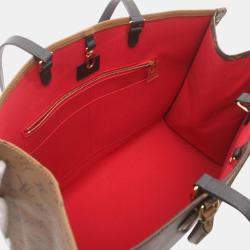 Louis Vuitton Brown Coated Canvas Leather On The Go Gm Monogram Giant Reverse Shoulder Bag